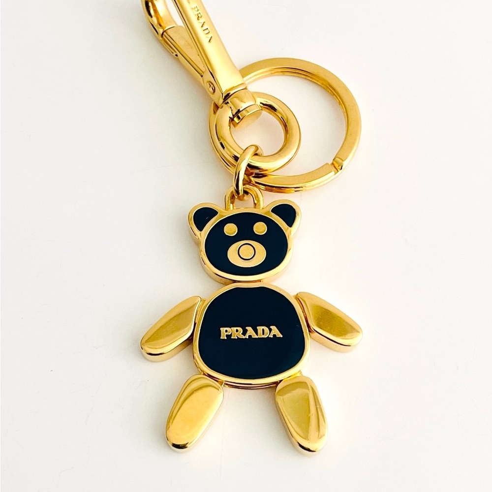 Prada gold/blue bear keychain